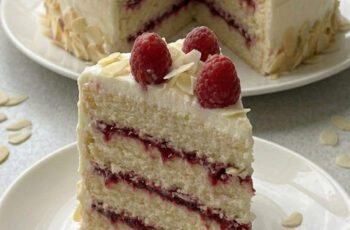 Bakery-Style White Chocolate Raspberry Almond Cake at Home